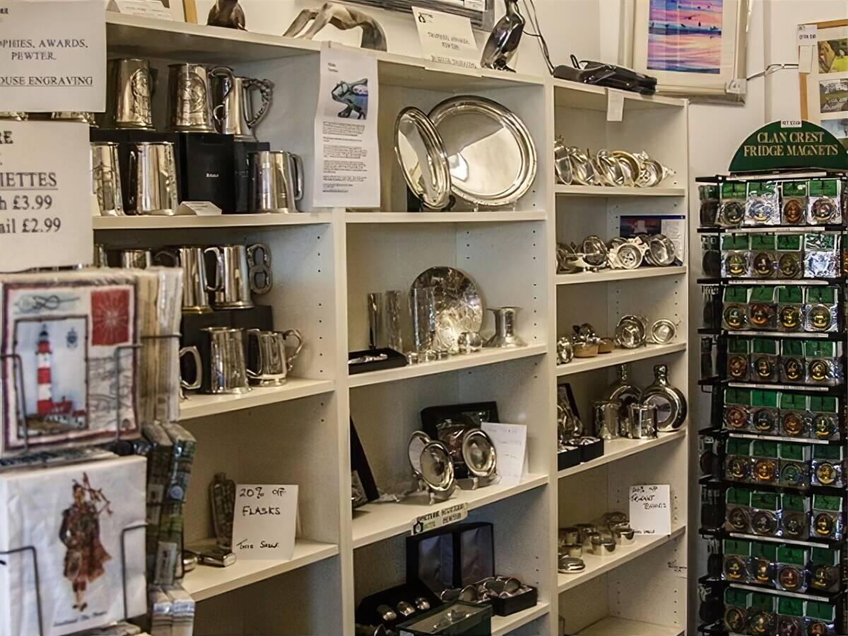 Shelving with pewter and souvenir products
